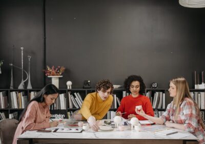 a team sitting on the table